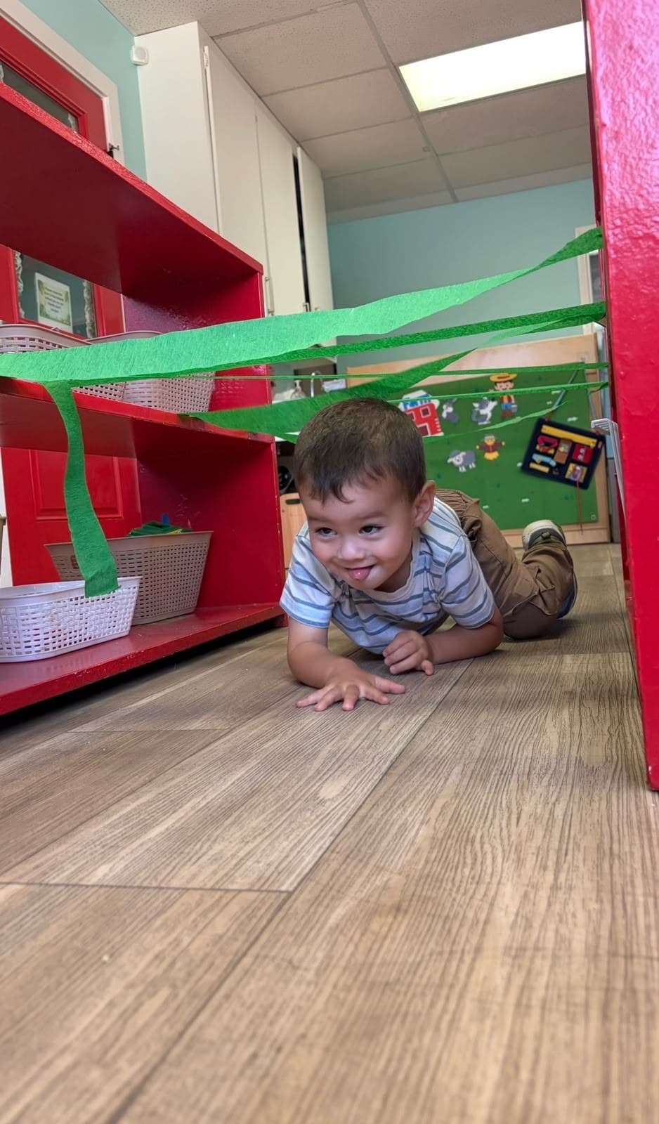 Toddler exploring during free play